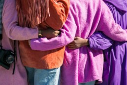 A group of four women supporting each other – Community Engagement for Care Homes