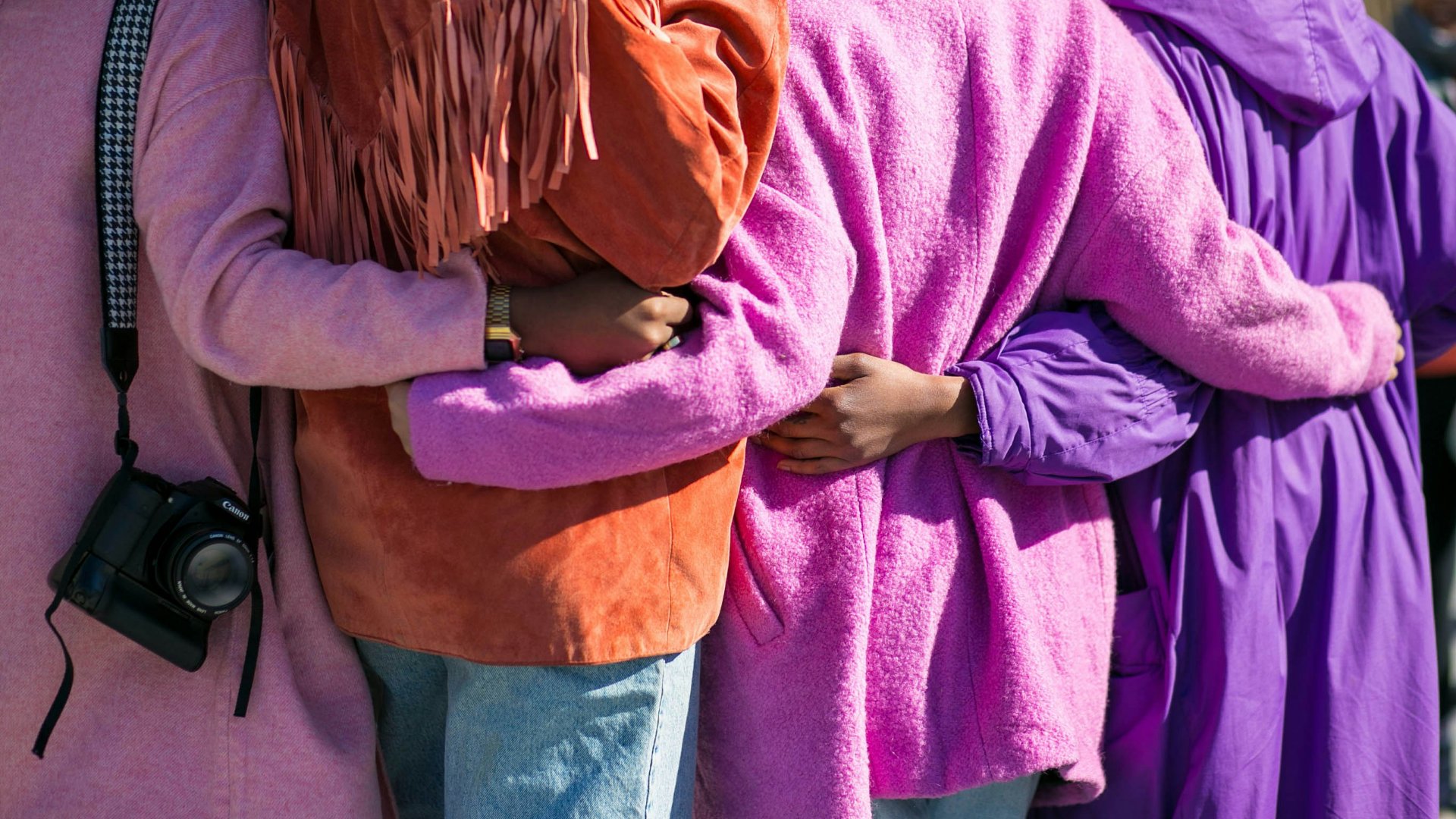 A group of four women supporting each other – Community Engagement for Care Homes